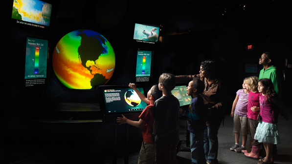 Museum visitors enjoying the exhibit at the MiaSci Museum